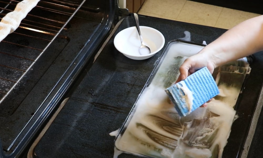 Brush the Oven Glass with Coarse Sponge