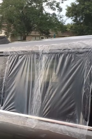 How To Cover A Broken Car Window With A Trash Bag