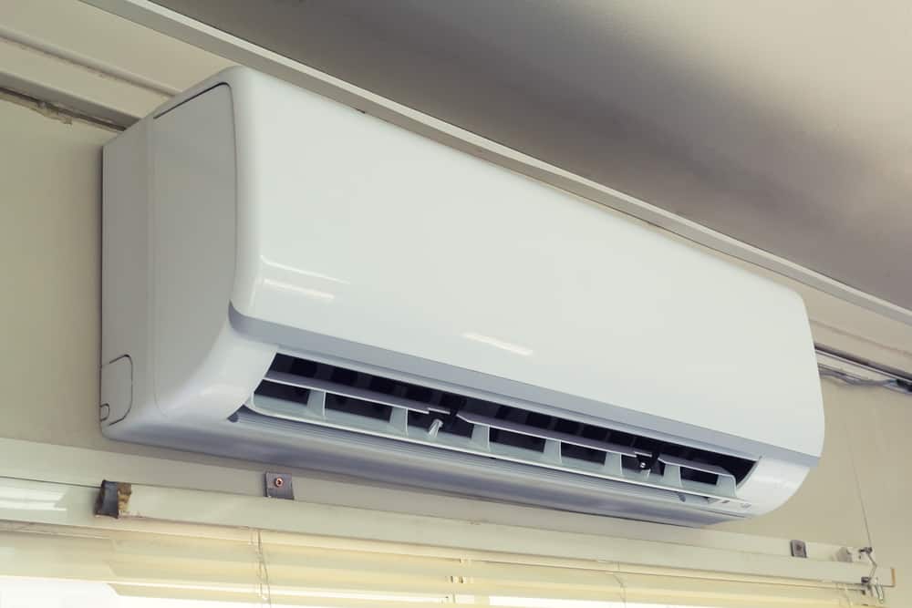Wall-mounted, split unit air conditioning system