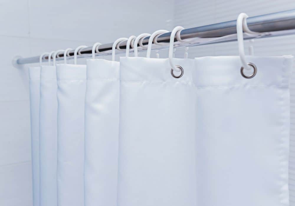Install a shower curtain or shower door 